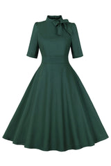 Dunkelgrünes Vintage Kleid aus den 1950er Jahren mit Stehkragen