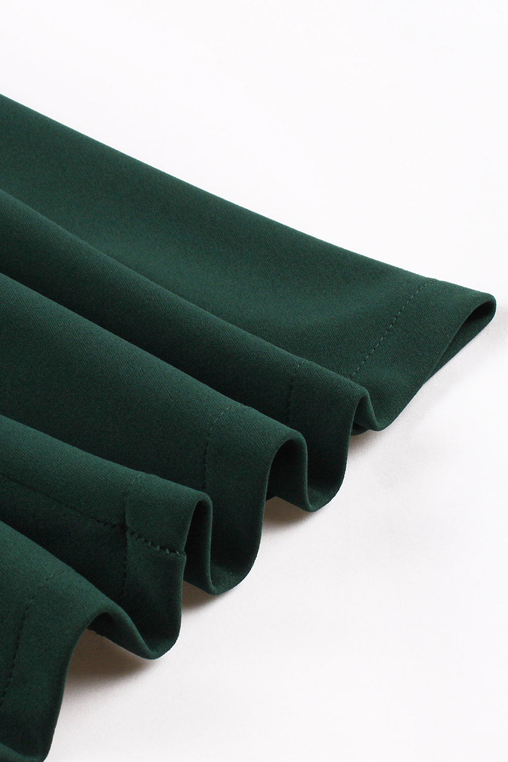 Dunkelgrünes einreihiges Kleid mit V-Ausschnitt aus den 1950er Jahren