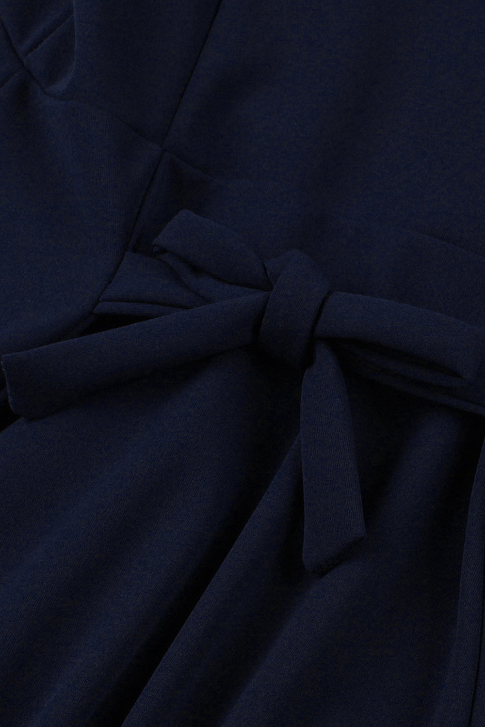 Dunkelgrünes einreihiges Kleid mit V-Ausschnitt aus den 1950er Jahren