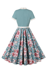Blaue Kleider mit Blumendruck aus den 1950er Jahren mit kurzen Ärmeln