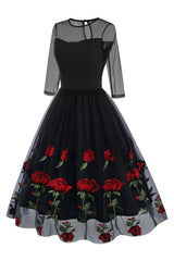 Schwarzes A-Linie Kleid mit Blumenmuster aus den 1950er Jahren mit halben Ärmeln