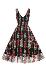 Schwarzes ärmelloses elegantes Vintage Kleid mit floraler Spitzenstickerei
