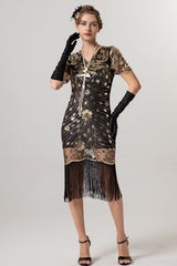 Glitzerndes V-Ausschnitt Schwarzes Goldenes Kleid aus den 1920er Jahren mit kurzen Ärmeln