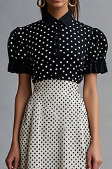 Vintage Schwarz-weißes Polka Dots Kleid mit Rüschen und Reversausschnitt