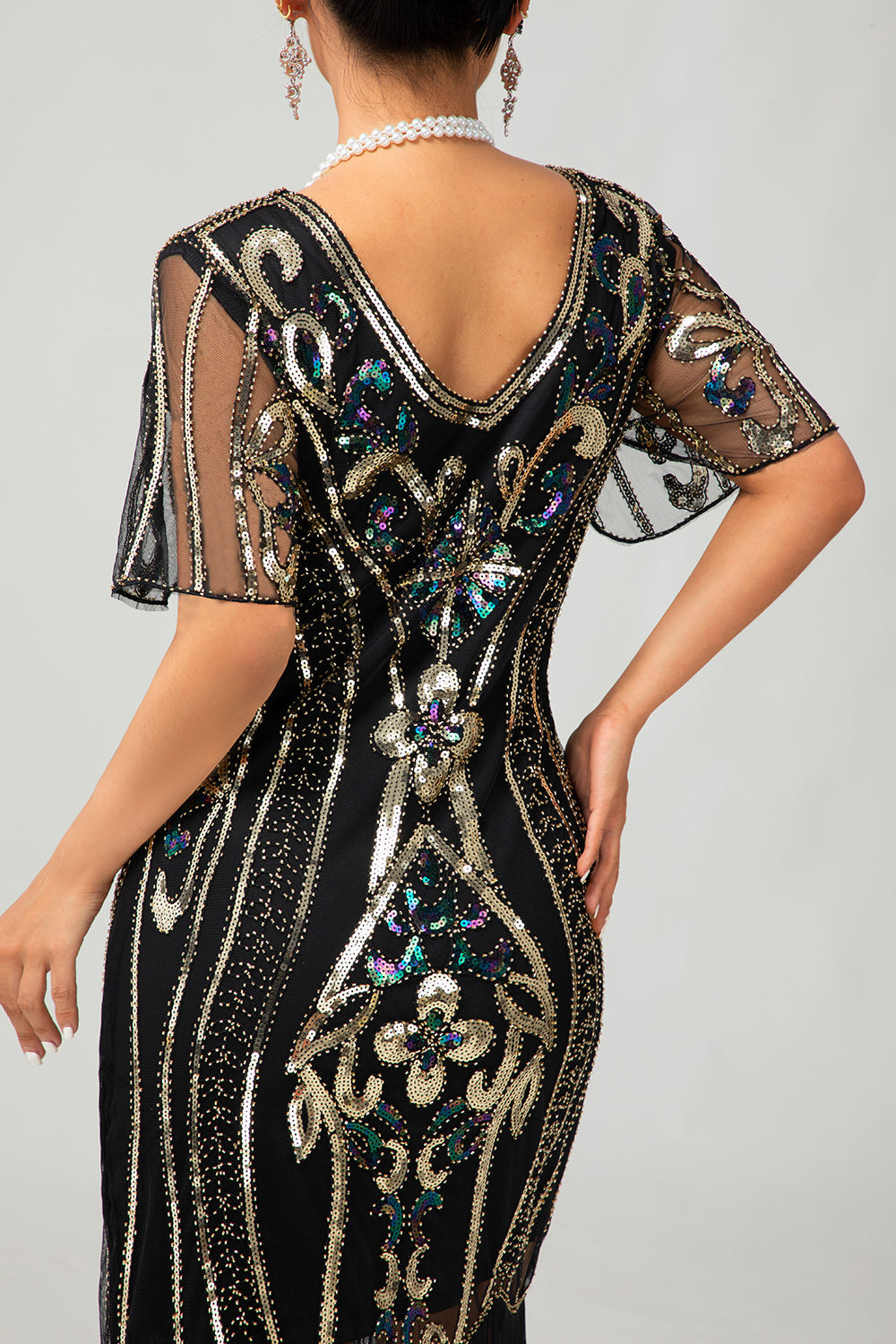 Glitzerndes Flapper Kleid aus den 1920er Jahren Schwarzes Goldenes Paillettenkleid mit Fransen
