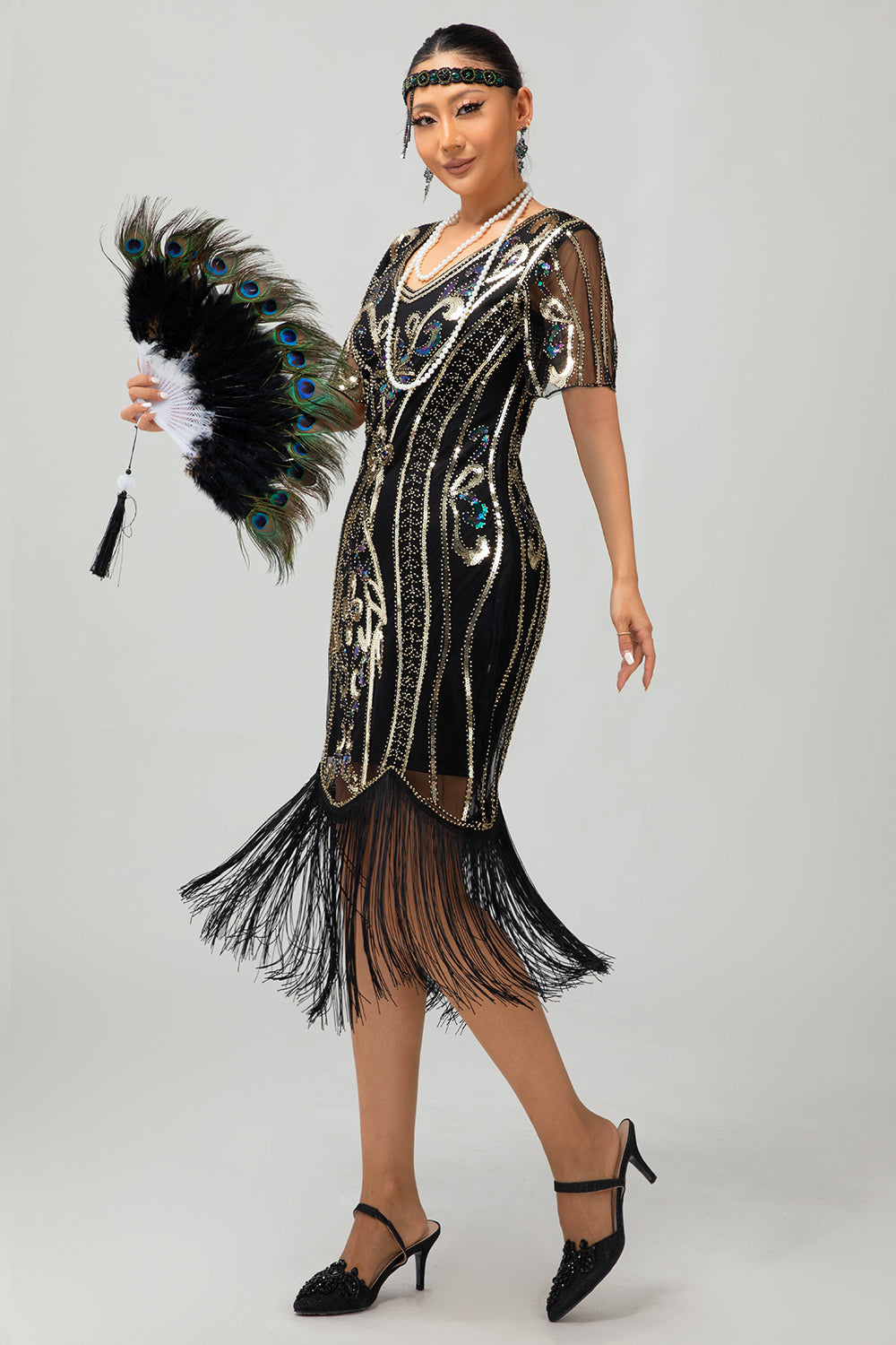 Glitzerndes Flapper Kleid aus den 1920er Jahren Schwarzes Goldenes Paillettenkleid mit Fransen