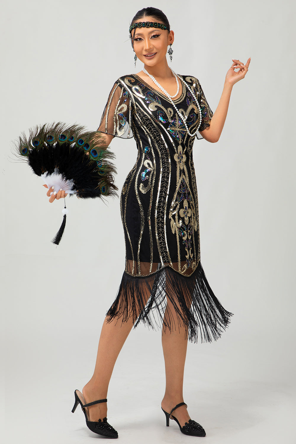Glitzerndes Flapper Kleid aus den 1920er Jahren Schwarzes Goldenes Paillettenkleid mit Fransen