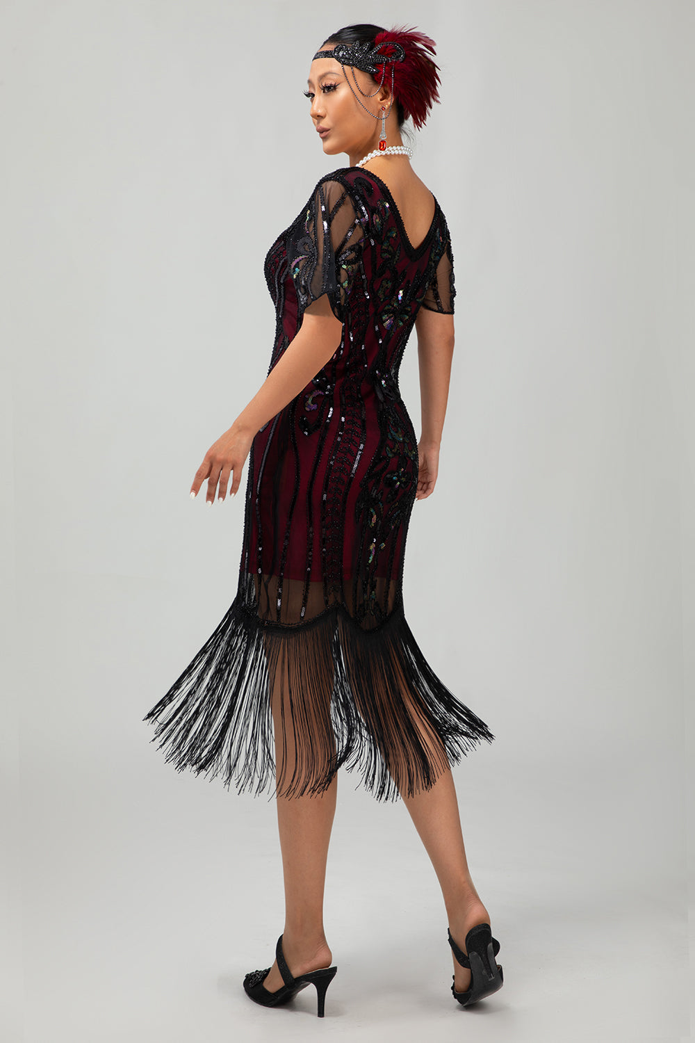 Aprikose Fransen Pailletten Flapperkleid aus den 1920er Jahren mit kurzen Ärmeln