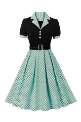 Grünes kurzärmeliges Polka Dots 1950er Jahre Kleid mit Gürtel