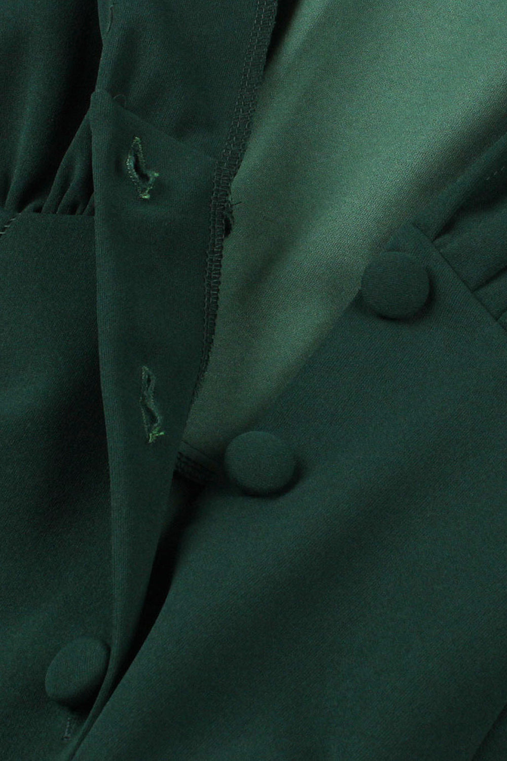 Grünes Kleid mit tiefem V-Ausschnitt aus den 1950er Jahren und kurzen Ärmeln