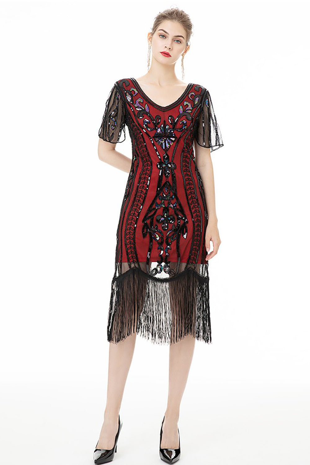 Glitzerndes Kleid aus den 1920er Jahren mit schwarzen Fransen und kurzen Ärmeln