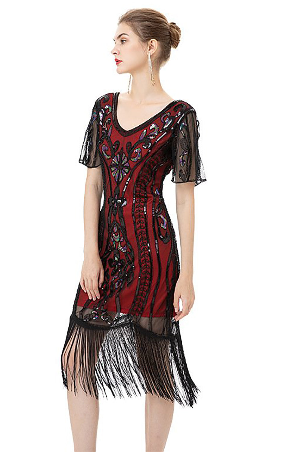 Glitzerndes Kleid aus den 1920er Jahren mit schwarzen Fransen und kurzen Ärmeln